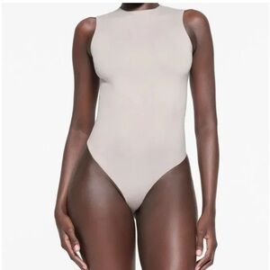 SKIMS essential crewneck bodysuit in stone NWOT